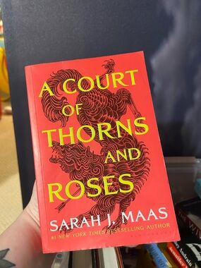 A Court of Thorns and Roses by Sarah J. Maas -